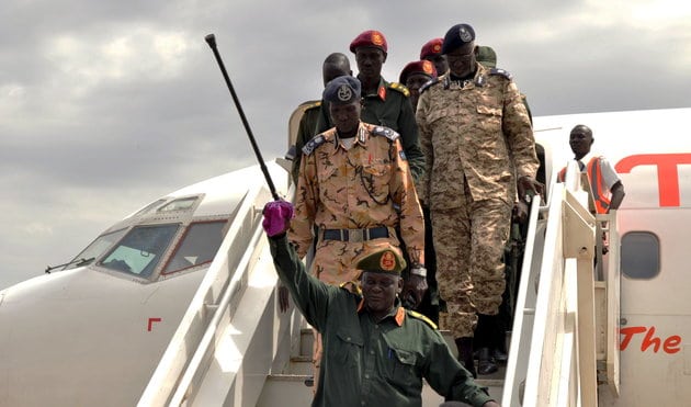 After months of delays, South Sudan’s opposition leader Riek Machar returned to the capital city of Juba on Tuesday, a day after his military chief of staff General Simon Gatwech Dual returned, pictured above.  