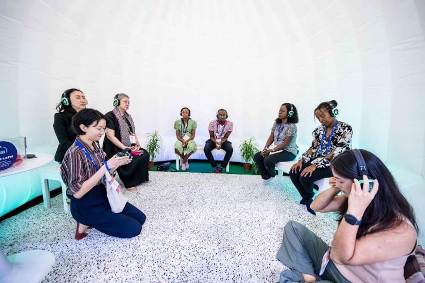 Inner Peace Pod listening on headphones